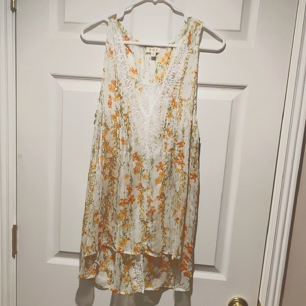Floral Sheer Sleeveless Top with Lace Open Back Detail.